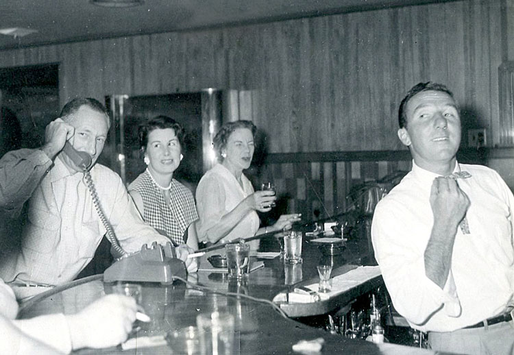 Baci (right) tending bar at Sullivan Creek dinner house, 1956