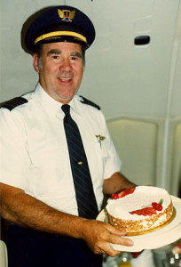 Stan in 1989 holding his retirement cake