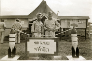 Walter Rogers on the right behind 21st Regiment sign