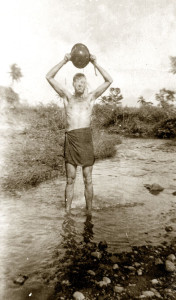 Walt showering in New Guinea, 1943 or 1944