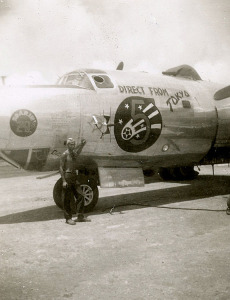 Allen in front of a B-29 that bombed Japan